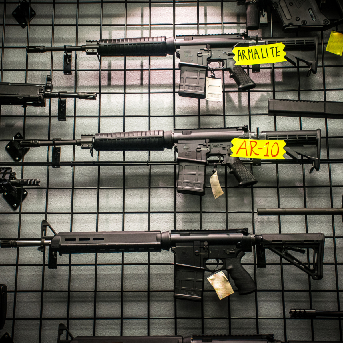 Assault Rifles for sale like the AR-15 and AR-10 hanging on the wall